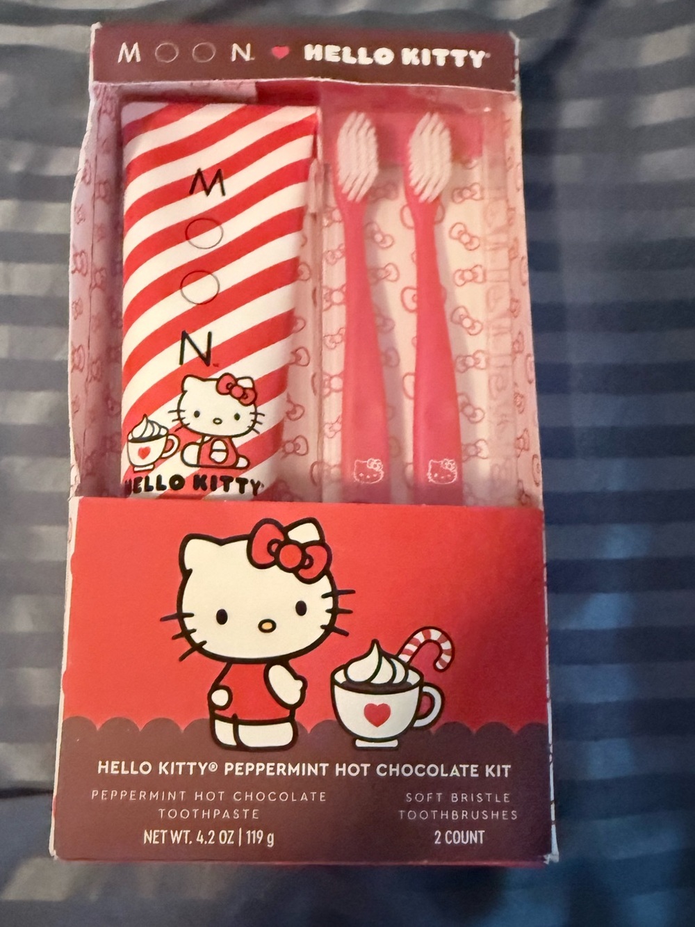 Hello Kitty, toothbrush, and toothpaste set